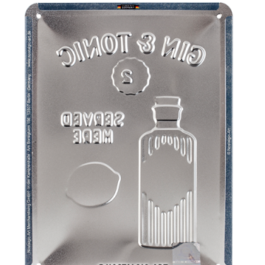 Metallic tin with a bottle and lemon design, featuring the text 'Gin & Tonic' and